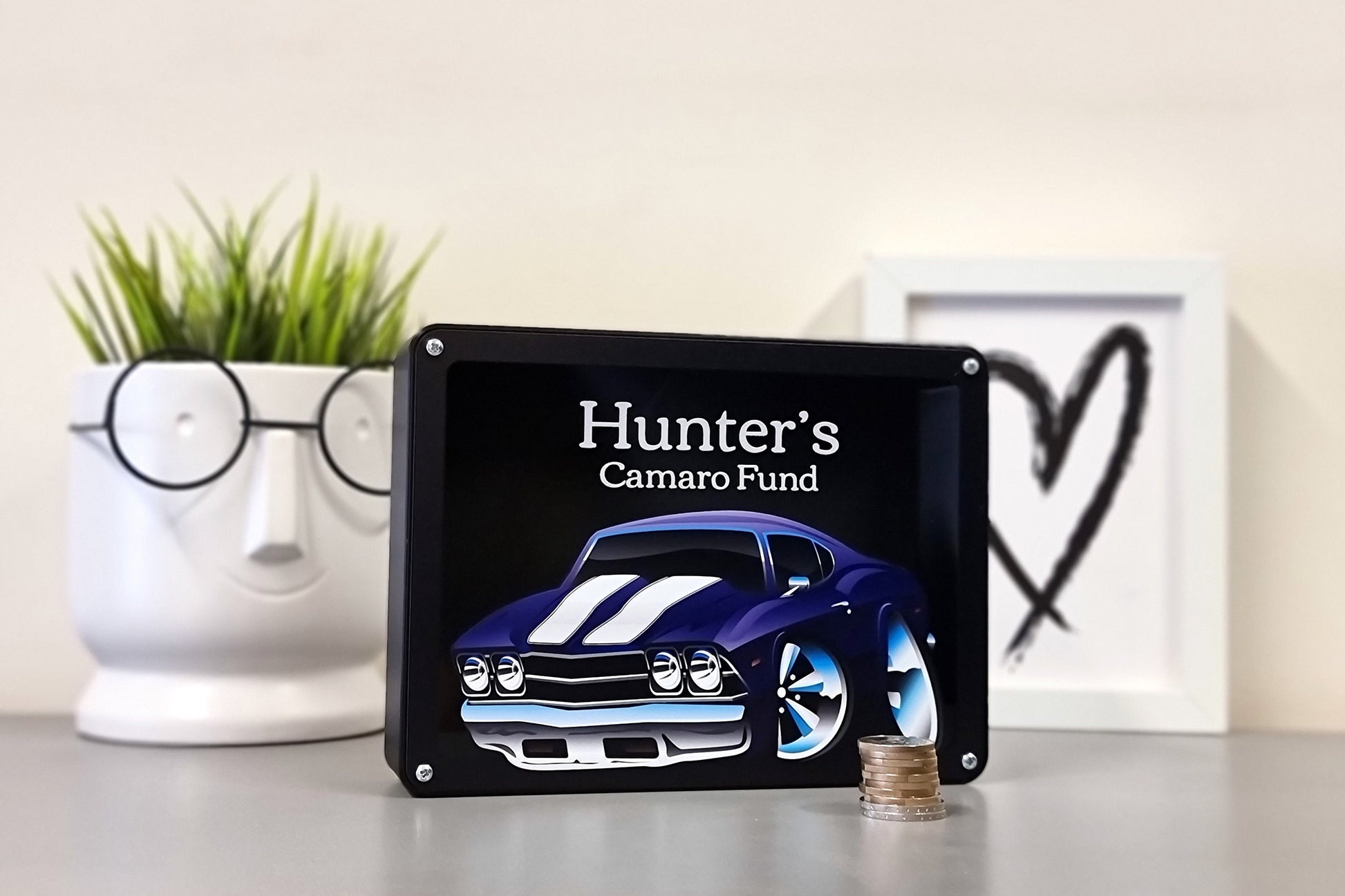 Personalized blue car-themed piggy bank for Hunter, perfect gift for car lovers and savings enthusiasts.