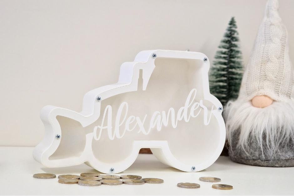 Personalized bulldozer piggy bank with the name Alexander, perfect gift for boys and kids.