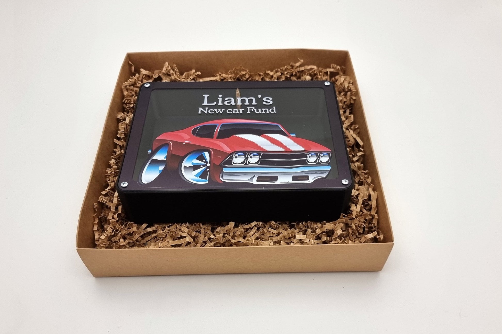 Personalized red car piggy bank beautifully displayed in a gift box, ready for special occasions