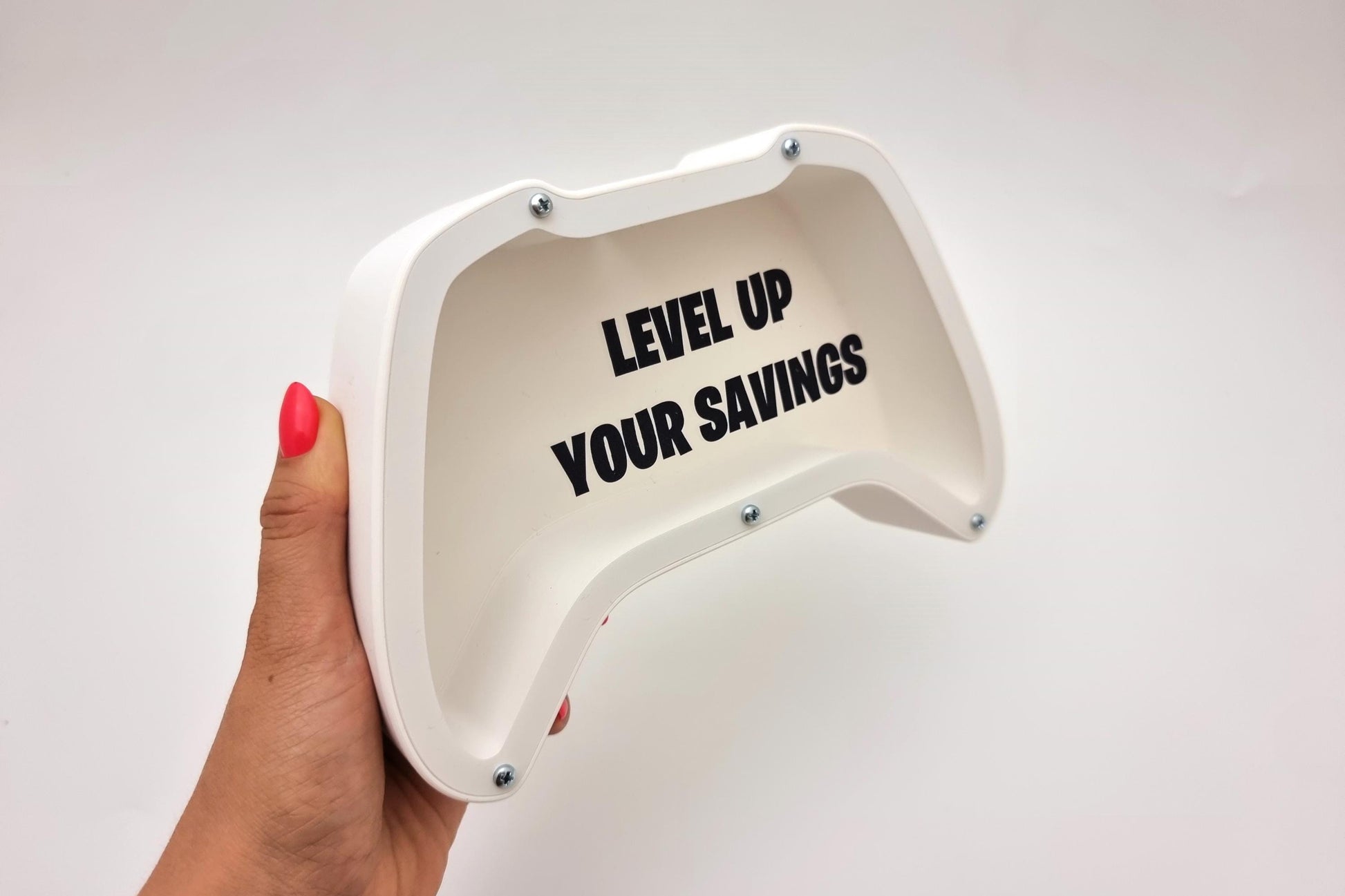 Gaming controller piggy bank with phrase Level up your savings - Perfect gift for gaming lovers!