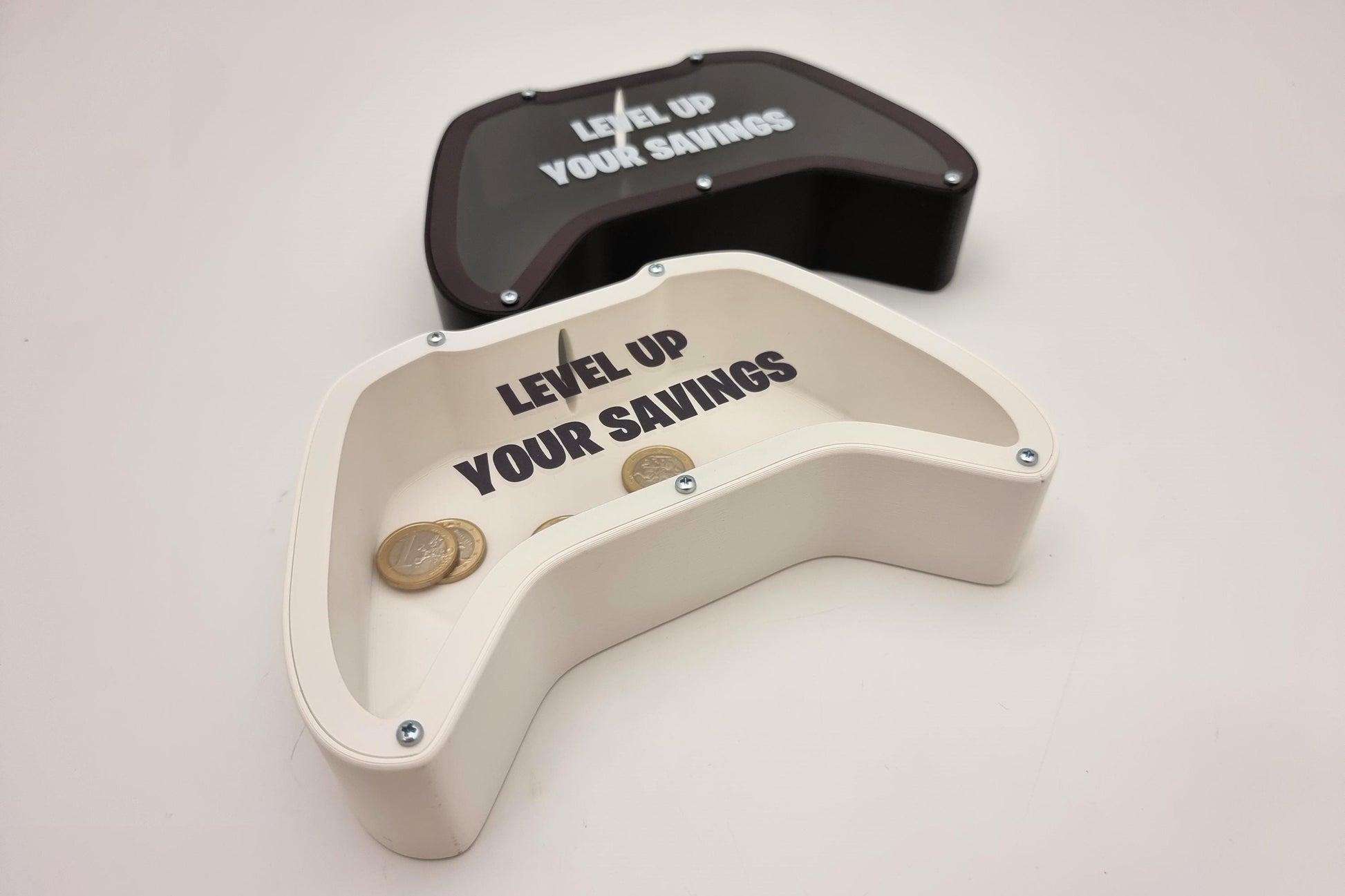 Gaming controller piggy bank with phrase Level up your savings - Perfect gift for gaming lovers!